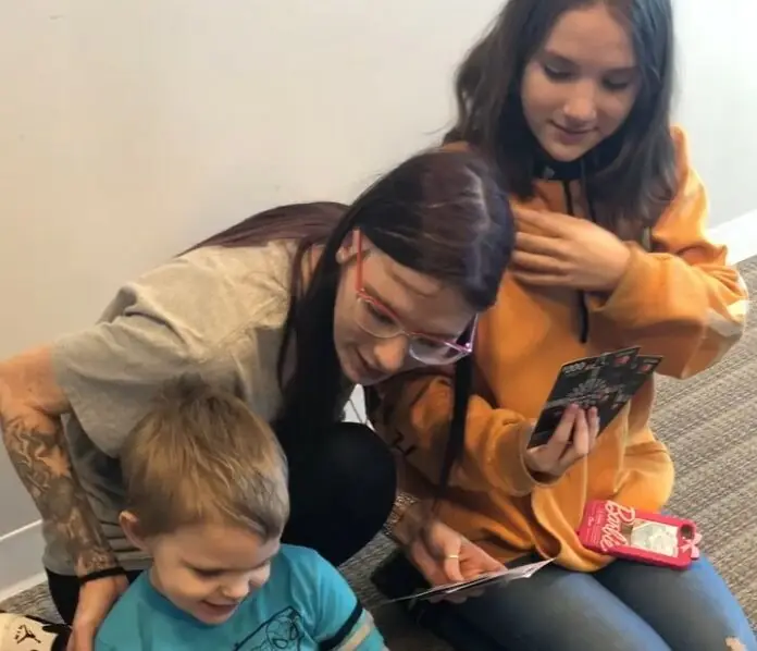 Nicole and her family at closing